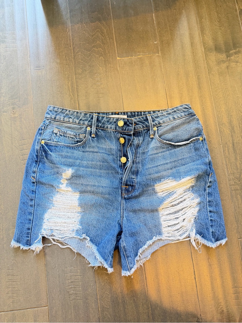 Good American Distressed Blue Button-Fly Jean Shorts